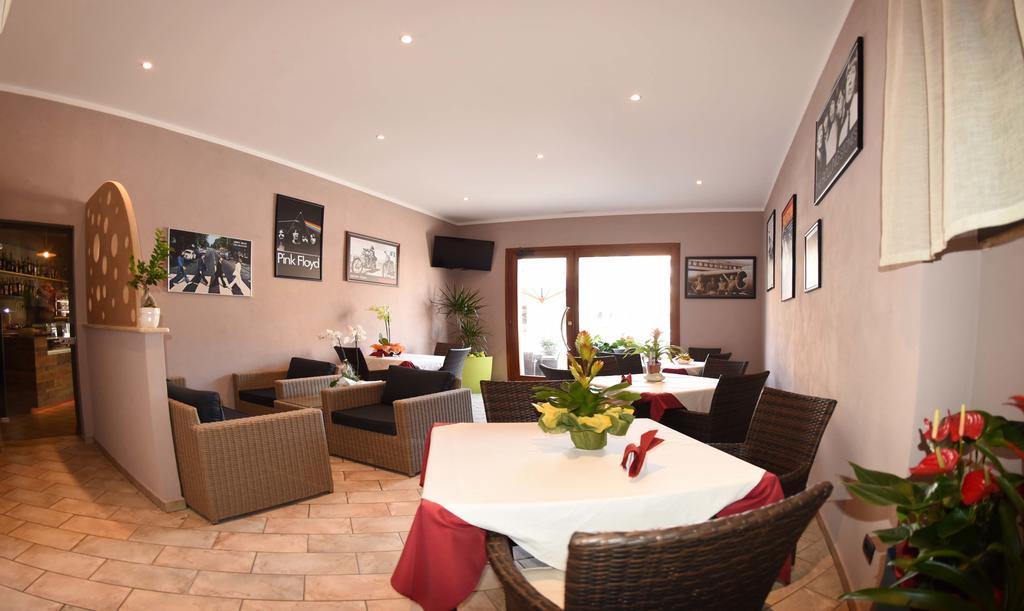 Albergo La Perla ออร์เบเตลโล ภายนอก รูปภาพ